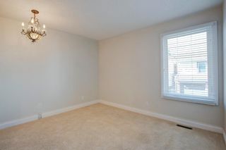 Photo 19: 212 Coachway Lane SW in Calgary: Coach Hill Row/Townhouse for sale : MLS®# A1153091