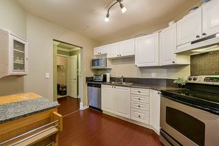 Photo 16: 412 5759 GLOVER Road in Langley: Langley City Condo for sale in "College Court" : MLS®# R2301267
