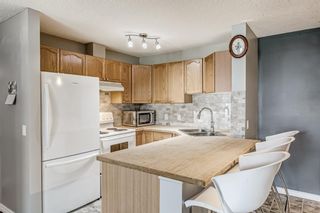 Photo 5: 106 9 Country Village Bay NE in Calgary: Country Hills Village Apartment for sale : MLS®# A1243678