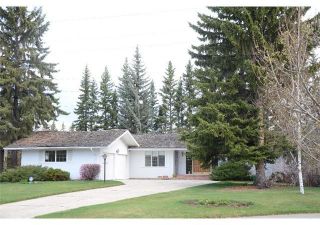 Photo 1: 6701 LARCH Court SW in Calgary: Lakeview Detached for sale : MLS®# A1196368