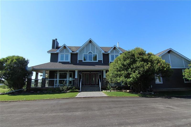 FEATURED LISTING: 280143 TWP RD 242 Chestermere