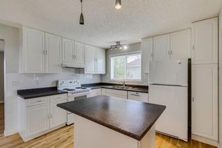 Photo 8: 655 Woodpark Boulevard SW in Calgary: Woodlands Detached for sale : MLS®# A2128158