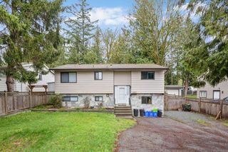 Photo 1: 4910 200 Street in Langley: Langley City House for sale : MLS®# R2864019