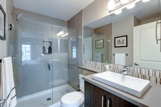 Photo 19: 450 Ascot Circle SW in Calgary: Aspen Woods Row/Townhouse for sale : MLS®# A1188870