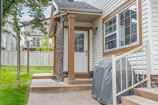 Photo 3: 201 70 Panatella Landing NW in Calgary: Panorama Hills Row/Townhouse for sale : MLS®# A2074229
