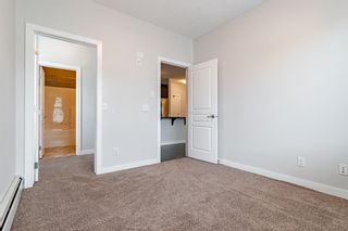 Photo 14: 303 48 Panatella Road NW in Calgary: Panorama Hills Apartment for sale : MLS®# A1231118