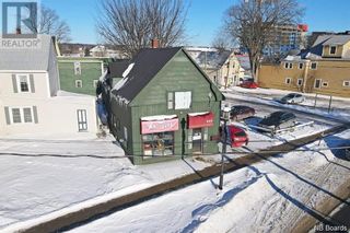 Photo 1: 111 King Street in Fredericton: Multi-family for sale : MLS®# NB093621