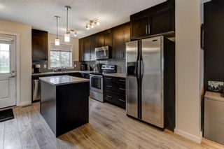 Photo 6: 1107 2400 Ravenswood View SE: Airdrie Row/Townhouse for sale : MLS®# A2134050