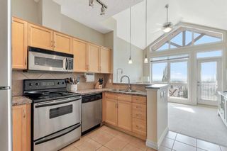 Photo 9: 8 148 Rockyledge View NW in Calgary: Rocky Ridge Row/Townhouse for sale : MLS®# A2069963