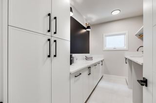 Photo 25: 100 Elkton Close SW in Calgary: Springbank Hill Detached for sale : MLS®# A1228336