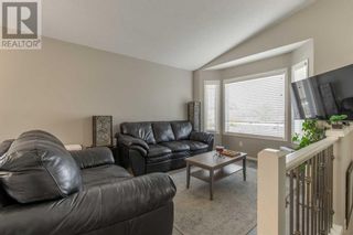 Photo 5: 110 Heritage Court W in Lethbridge: House for sale : MLS®# A2081300