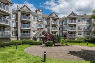 Photo 1: 110 20894 57 Avenue in Langley: Langley City Condo for sale in "BAYBERRY LANE" : MLS®# R2790549