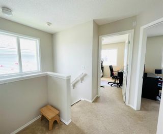 Photo 18: 15 Bridleridge Link SW in Calgary: Bridlewood Row/Townhouse for sale : MLS®# A1231939