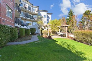 Photo 2: 408 19530 65 Avenue in Surrey: Clayton Condo for sale in "Willow Grand" (Cloverdale)  : MLS®# R2863369