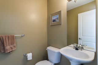 Photo 4: 97 100 KLAHANIE Drive in Port Moody: Port Moody Centre Townhouse for sale in "Indigo" : MLS®# R2075221
