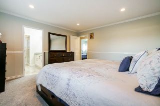 Photo 21: 12860 CARLUKE Crescent in Surrey: Queen Mary Park Surrey House for sale : MLS®# R2516199