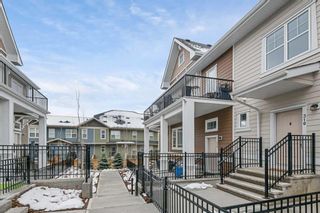 Main Photo: 312 Cranbrook Walk SE in Calgary: Cranston Row/Townhouse for sale : MLS®# A2128809