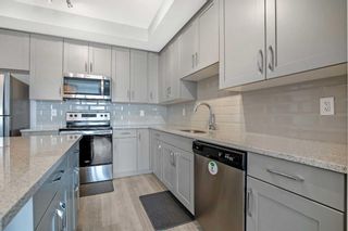 Photo 11: 313 71 Shawnee Common SW in Calgary: Shawnee Slopes Apartment for sale : MLS®# A2129027