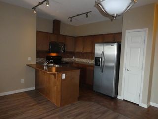 Photo 10: 3406 92 Crystal Shores Road: Okotoks Apartment for sale : MLS®# A1258909