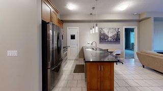 Photo 2: 404 1818 14 Street SW in Calgary: Lower Mount Royal Apartment for sale : MLS®# A2092370