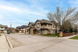 Photo 1: 106 3 Everridge Square SW in Calgary: Evergreen Row/Townhouse for sale : MLS®# A2127575