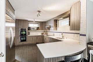 Photo 5: 6051 Dalcastle Drive NW in Calgary: Dalhousie Detached for sale : MLS®# A1257990