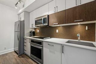 Photo 7: 120 619 Confluence Way SE in Calgary: Downtown East Village Apartment for sale : MLS®# A2114124