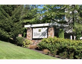 Photo 1: 224 1465 PARKWAY Boulevard in Coquitlam: Westwood Plateau Townhouse for sale in "SILVER OAKS" : MLS®# V787781
