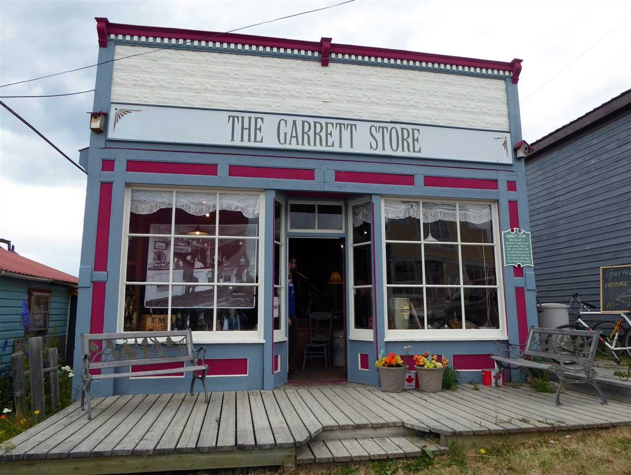 The Garret Store was built in 1917, after fire destroyed most of the town core and operated by John and Mary Garrett as a general store until 1941. They sold groceries, dry goods, raw furs and Mrs. Garrett's fresh baked bread.