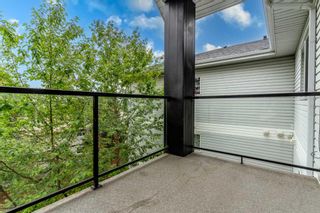 Photo 14: 316 2022 Canyon Meadows Drive SE in Calgary: Queensland Apartment for sale : MLS®# A2059840