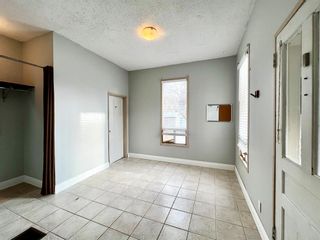 Photo 5: 839 4 Avenue NW in Calgary: Sunnyside Detached for sale : MLS®# A2021890