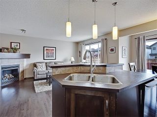 Photo 4: 681 CRANSTON Drive SE in Calgary: Cranston House for sale : MLS®# C4110392