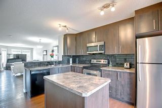 Photo 5: 906 2445 Kingsland Road SE: Airdrie Row/Townhouse for sale : MLS®# A2000040