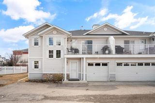 Photo 1: 613 Country Village Cape NE in Calgary: Country Hills Village Row/Townhouse for sale : MLS®# A2040358