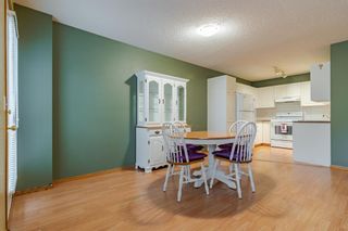 Photo 6: 115 Mt Aberdeen Manor SE in Calgary: McKenzie Lake Row/Townhouse for sale : MLS®# A1147019