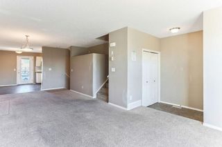 Photo 3: 1106 PRAIRIE SOUND Circle NW: High River Row/Townhouse for sale : MLS®# C4239510