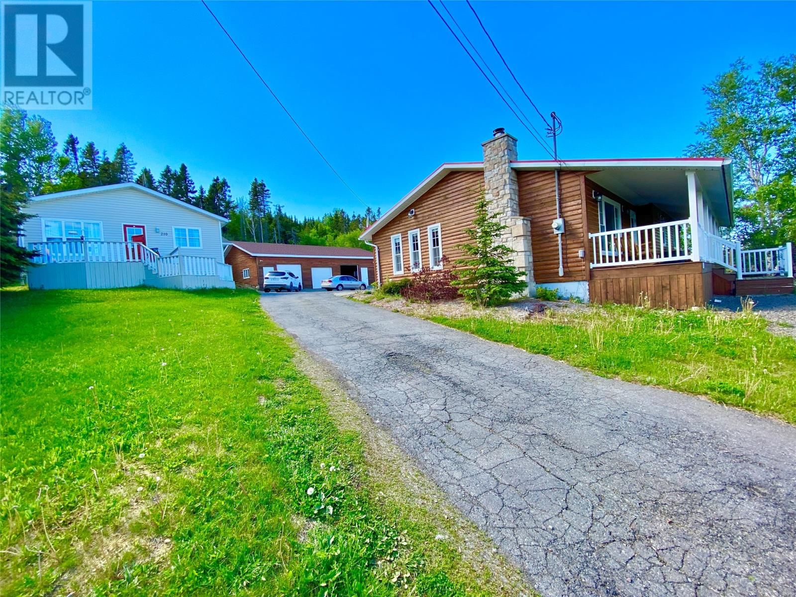 Main Photo: 210-212 Bob Clark Drive in Campbellton: House for sale : MLS®# 1258905