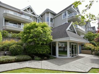 Photo 1: 205 5556 201A Street in Langley: Langley City Condo for sale in "Michaud Gardens" : MLS®# F1312090