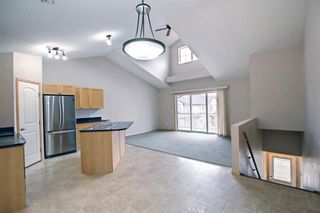 Photo 4: 204 100 Panatella Landing NW in Calgary: Panorama Hills Row/Townhouse for sale : MLS®# A1220825