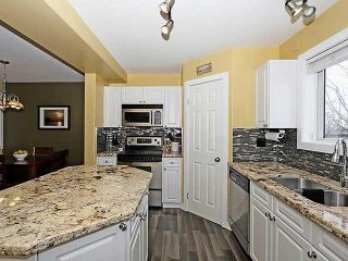 Photo 8: 310 COVENTRY Road NE in Calgary: Coventry Hills House for sale : MLS®# C3655004
