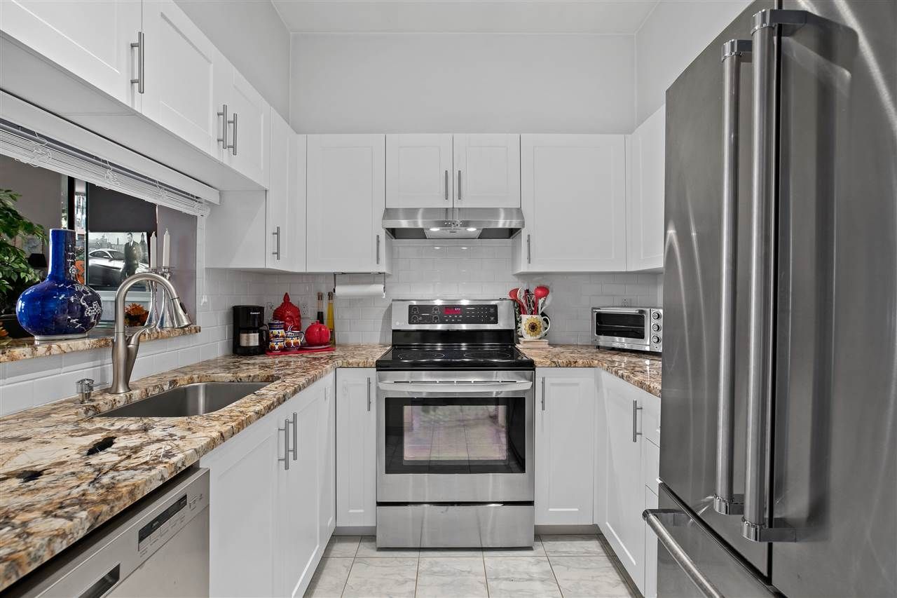 Photo 6: Photos: 411 2105 W 42ND Avenue in Vancouver: Kerrisdale Condo for sale in "The Brownstone" (Vancouver West)  : MLS®# R2387494