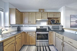 Photo 10: 246 Anderson Grove SW in Calgary: Cedarbrae Row/Townhouse for sale : MLS®# A1100307