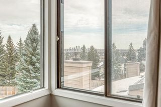 Photo 19: 10 Coach  Manor Rise SW in Calgary: Coach Hill Row/Townhouse for sale : MLS®# A1077472