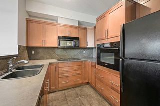 Photo 11: 325 26 Val Gardena View SW in Calgary: Springbank Hill Apartment for sale : MLS®# A2083293