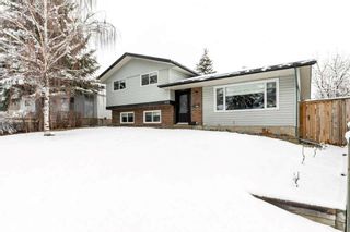 Main Photo: 100 Silver Brook Drive NW in Calgary: Silver Springs Detached for sale : MLS®# A2123581
