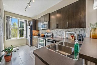 Photo 5: 233 Ascot Circle SW in Calgary: Aspen Woods Row/Townhouse for sale : MLS®# A2068888