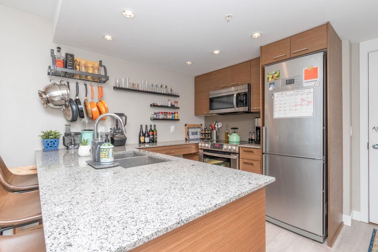 Photo 5: Photos: 411 135 E 17TH Street in North Vancouver: Central Lonsdale Condo for sale in "THE LOCAL" : MLS®# R2616612