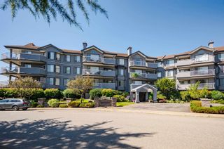 Photo 2: 211 5375 205 Street in Langley: Langley City Condo for sale in "Glenmont Park" : MLS®# R2724460