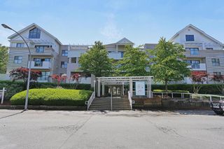 Photo 1: 202 20268 54 Avenue in Langley: Langley City Condo for sale in "BRIGHTON PLACE" : MLS®# R2164660