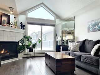 Photo 2: 405 10 Sierra Morena Mews SW in Calgary: Signal Hill Apartment for sale : MLS®# A2030186